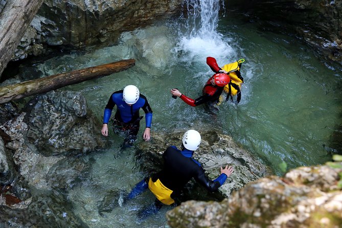 Bled and Bohinj Valley Canyoning with Hotel Pickup & Free Photos - Cold Streams, Rock Slides, and Cliff Descents