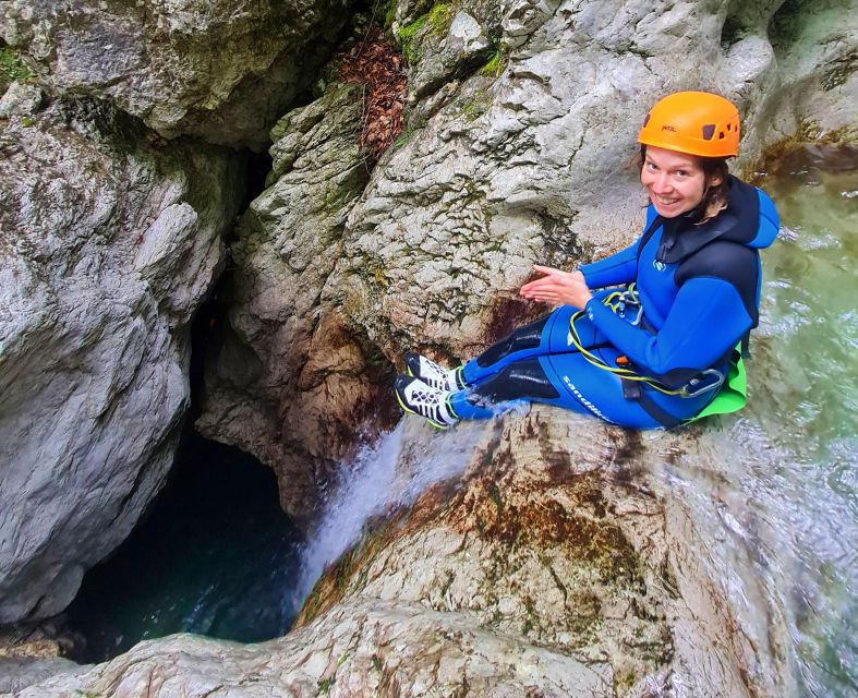 Bovec: Canyoning for Beginners Experience - The final slide into the emerald pool