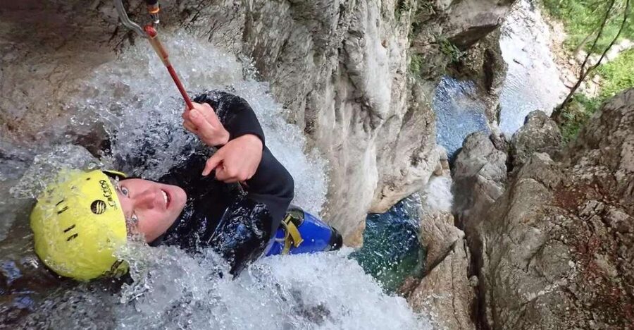 Bovec: Sušec Canyon Canyoning Experience - Entering Sušec Canyon and following the waterfalls