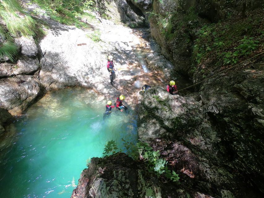 From Bovec: Half-Day Canyoning Tour in Soča Valley - The 8-meter cave slide and 12-meter waterfall jump