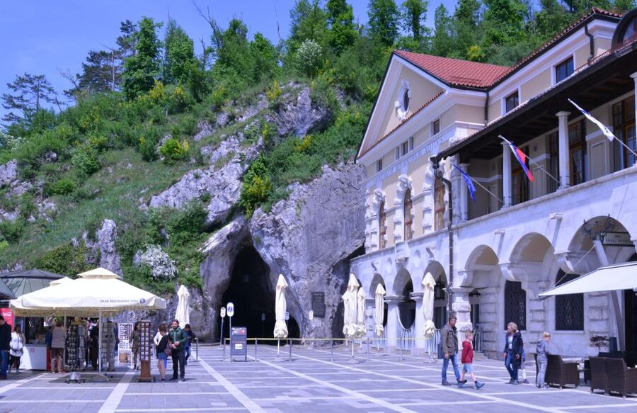 From Ljubljana: Postojna Cave & Predjama Castle Guided Trip - Seeing Predjama Castle Built into the Cliff