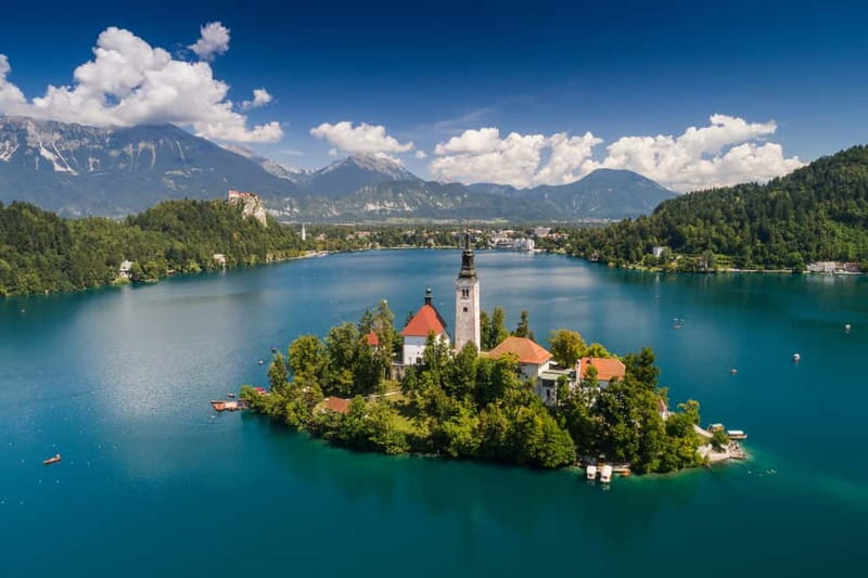 From Trieste: Ljubljana and Lake Bled Full-Day Bus Tour - Walking Ljubljana beside the Ljubljanica