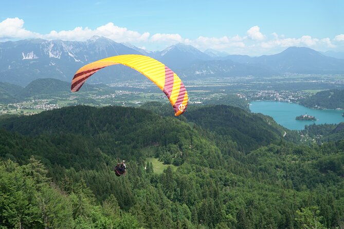 Lake Bled Tandem Paragliding - Leaving Bled for the hillside launch point