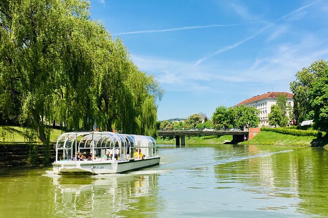 Ljubljana boat cruise and walking tour - Dragon Bridge and Ljubljana’s riverfront