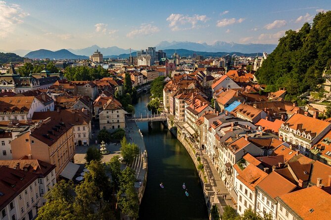 Ljubljana Stand-Up Paddle Boarding Lesson and Tour - Dragon Bridge and its playful details