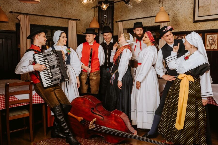 Ljubljana: Traditional Slovenian Dinner and Show - Arriving with schnapps and šklojce