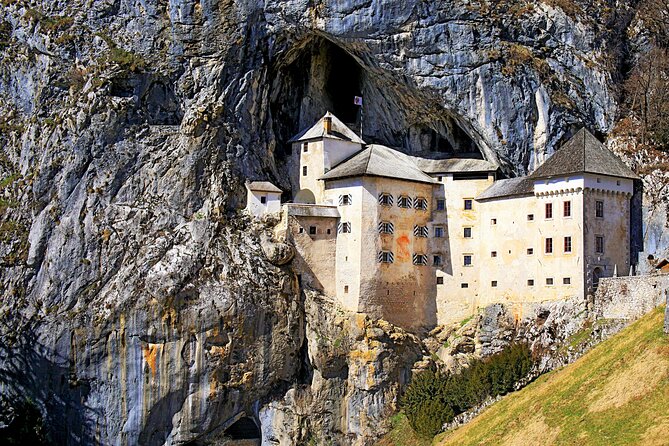 Postojna Cave and Predjama Castle Tour from Ljubljana - Predjama Castle inside the cliff