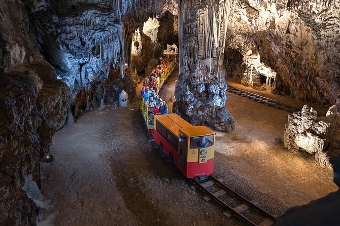 Postojna Cave with Train Ride and Predjama Castle Half Day Trip from Ljubljana - Entering Postojna Cave by train