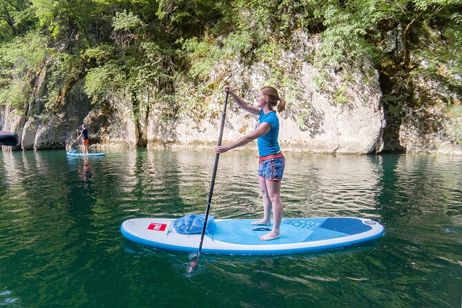 Private Half Day Stand-up Paddle Boarding on the Soča River - Learning to stand on the board
